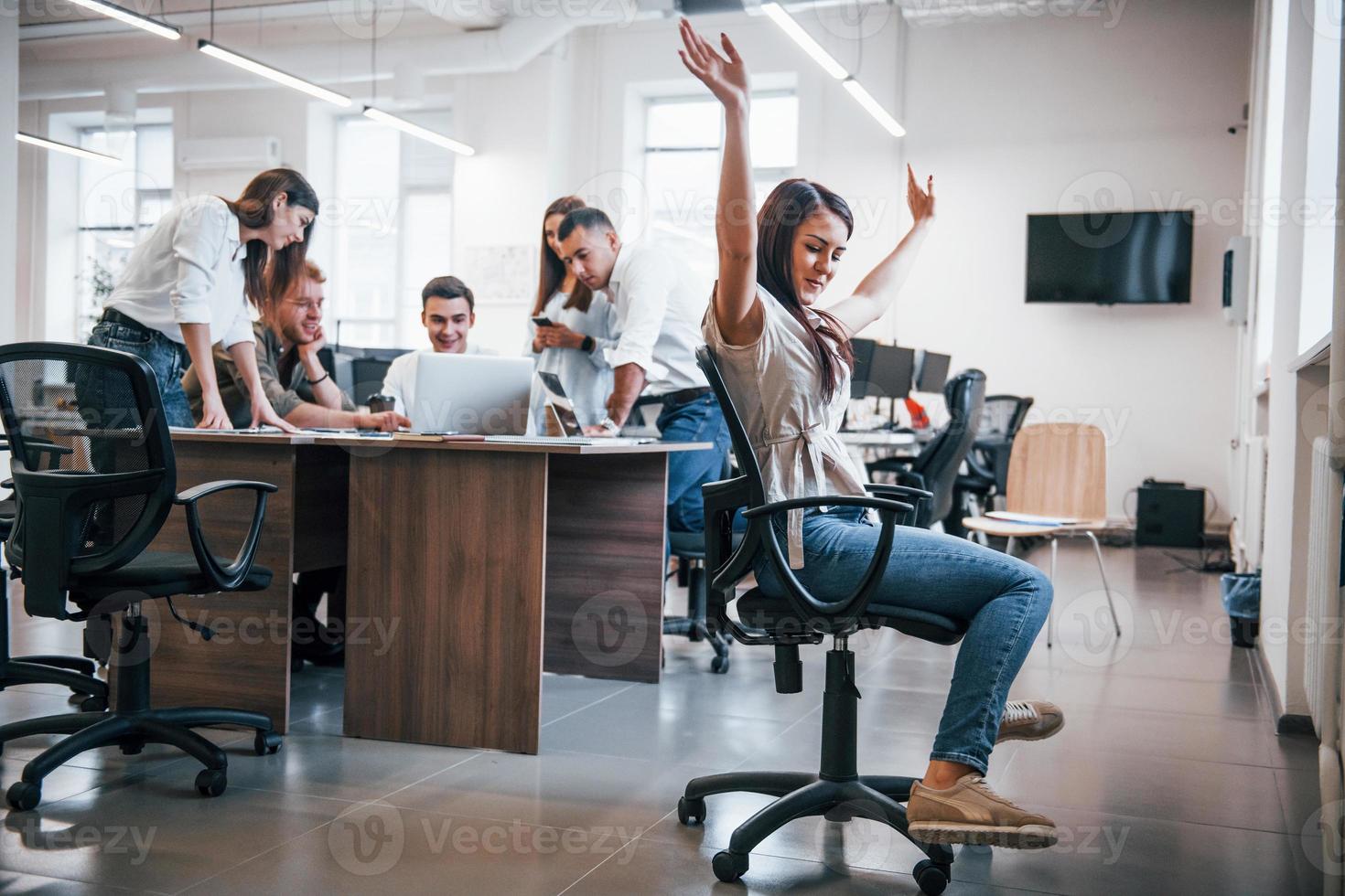 Young business people working together in the modern office photo