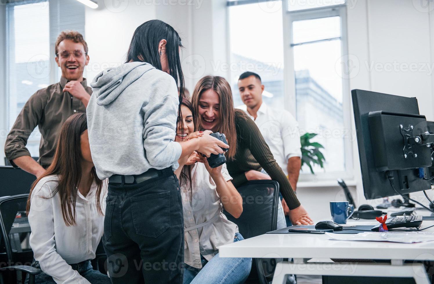 Young business people working together in the modern office photo