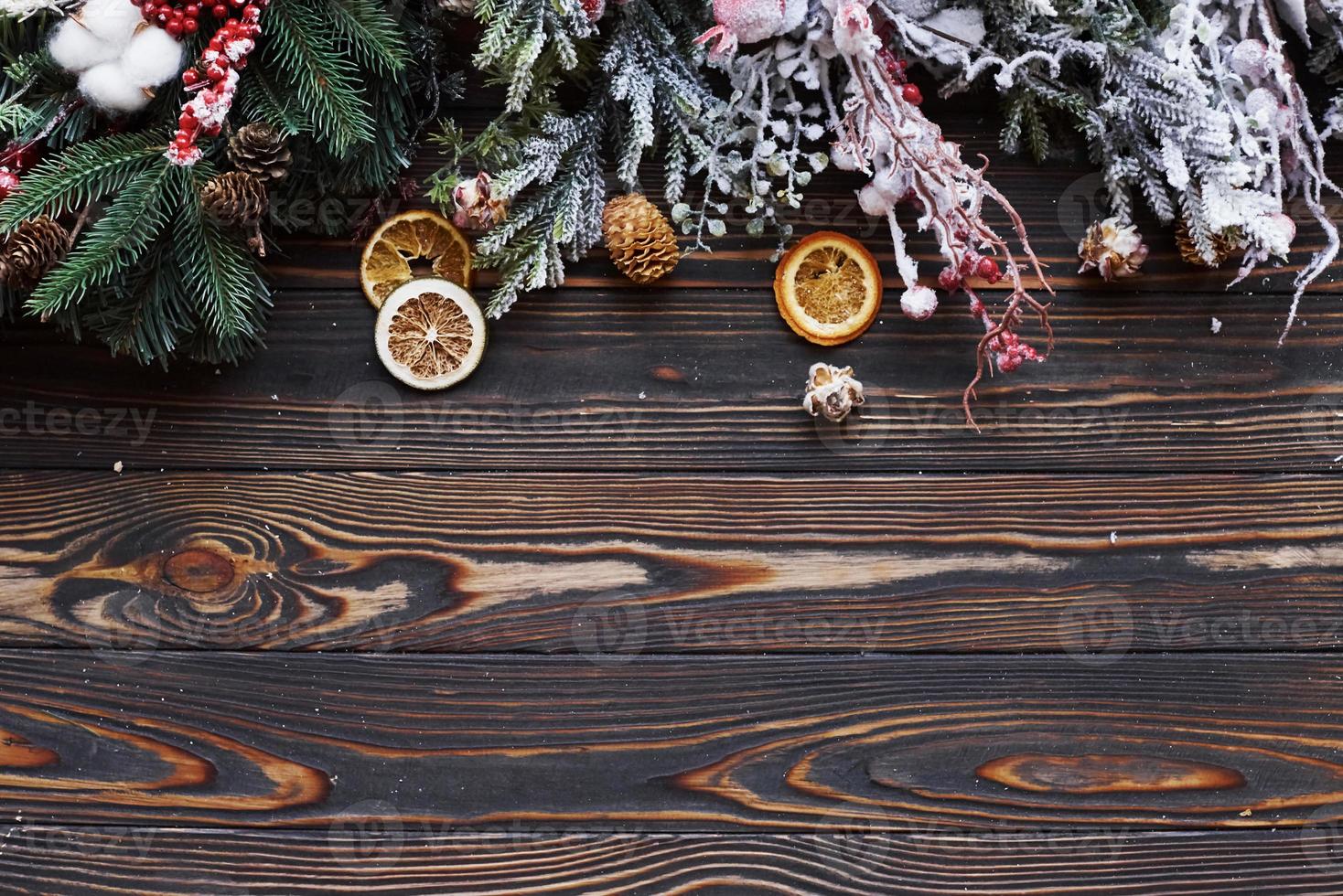 Green fir branches. Top view of christmas festive frame with new year decorations photo