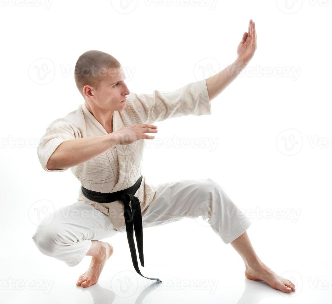 Karate. Man in a kimono photo