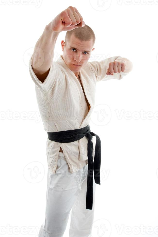 Karate. Man in a kimono photo