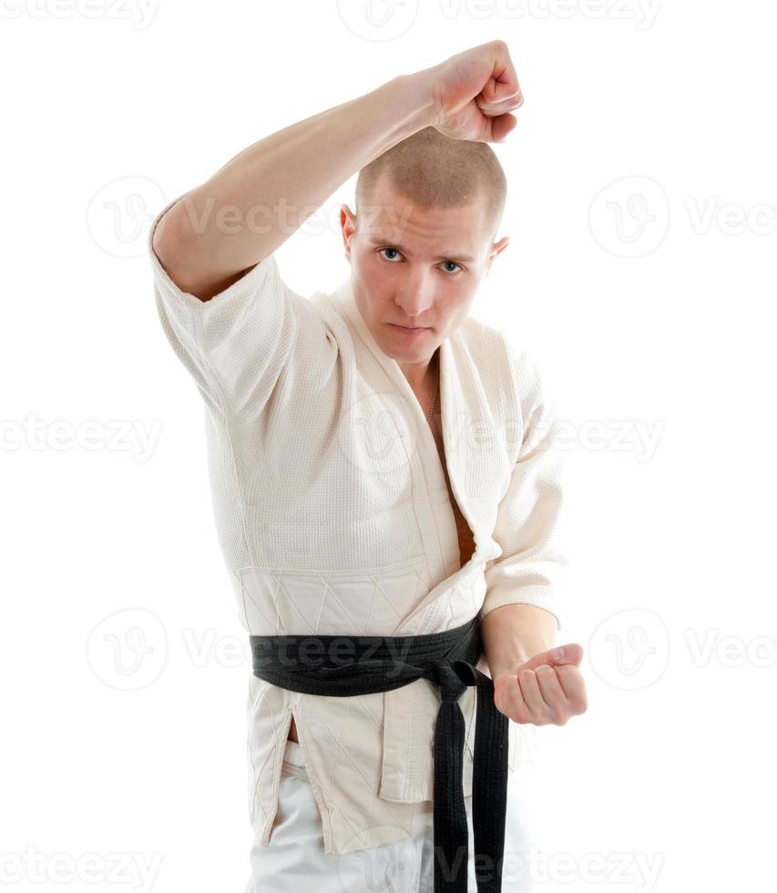 Karate. Man in a kimono photo