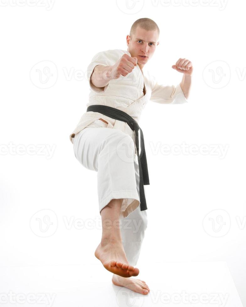 Karate. Man in a kimono photo