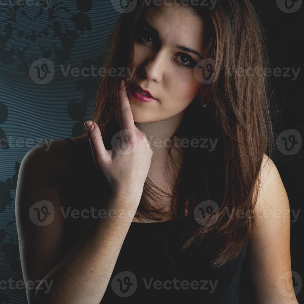 fashion model on a dark background photo