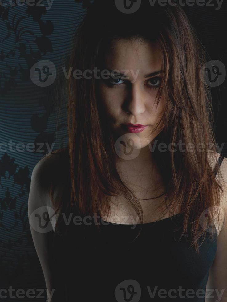 fashion model on a dark background photo