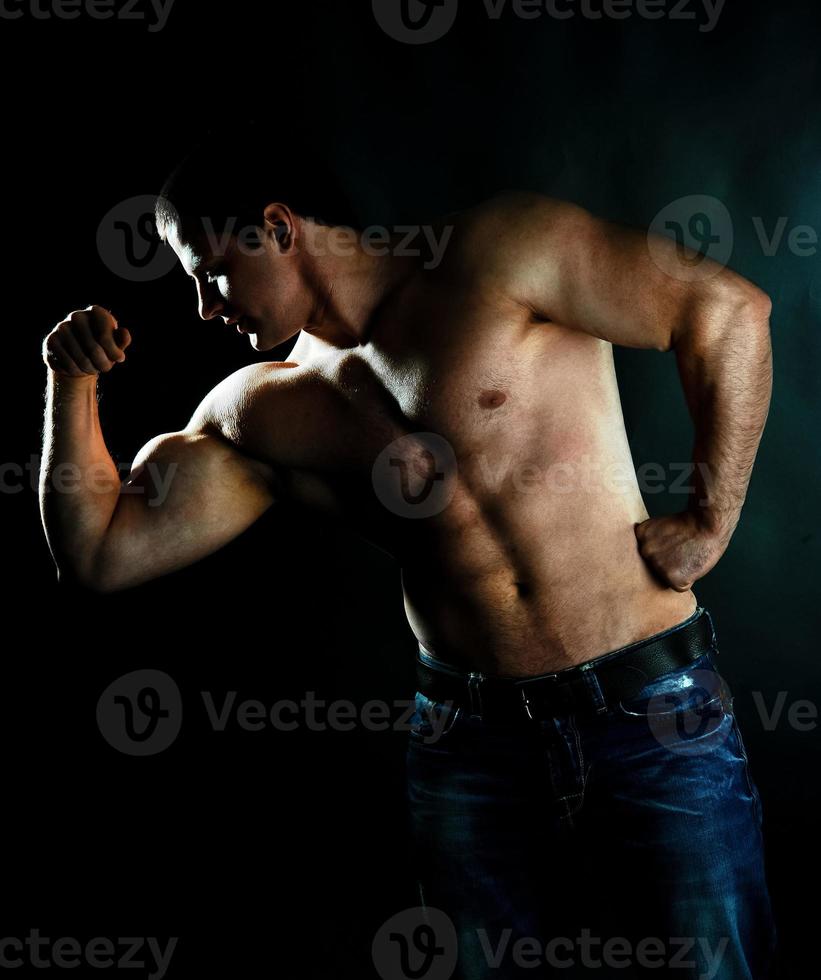 strong muscular athletic man photo