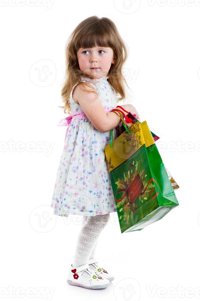 niña de compras foto