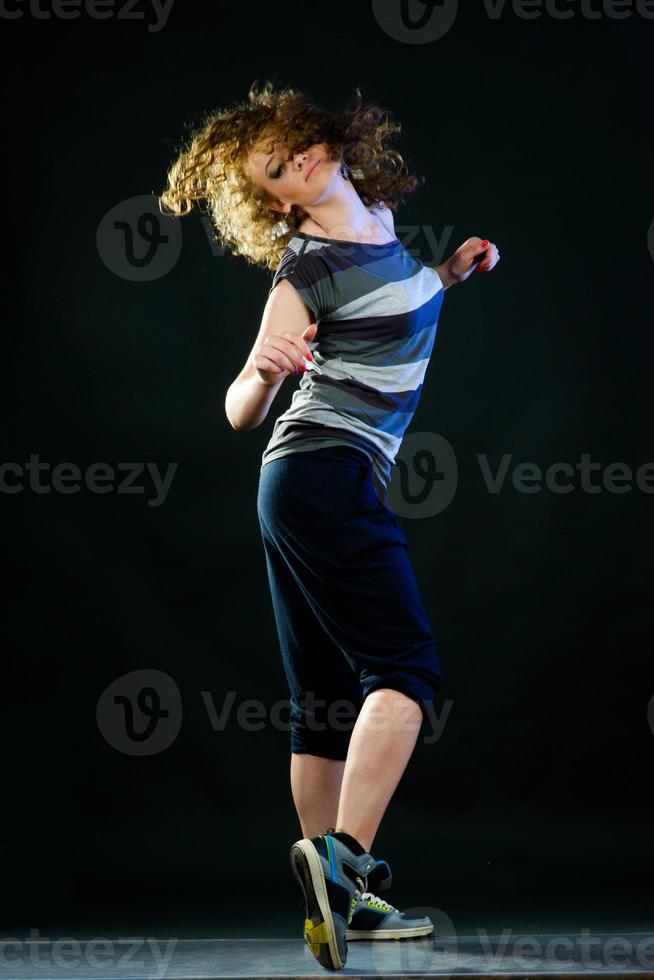 young woman dancing photo