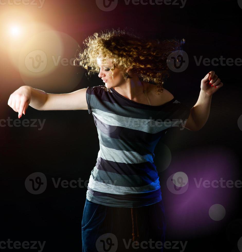 young woman dancing photo