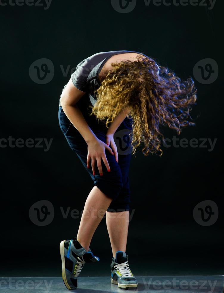 young woman dancing photo