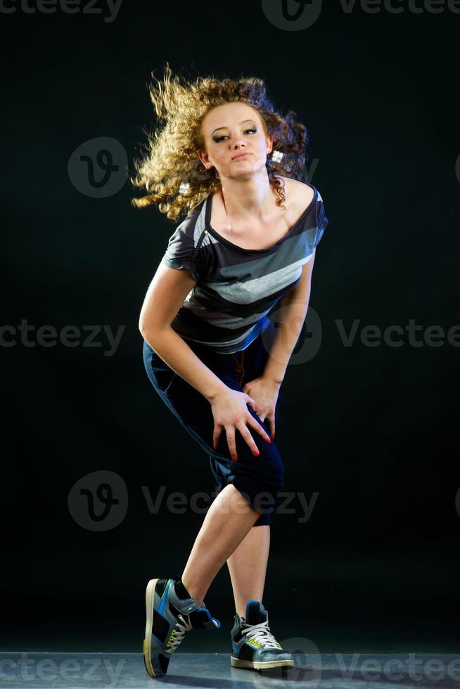 young woman dancing photo