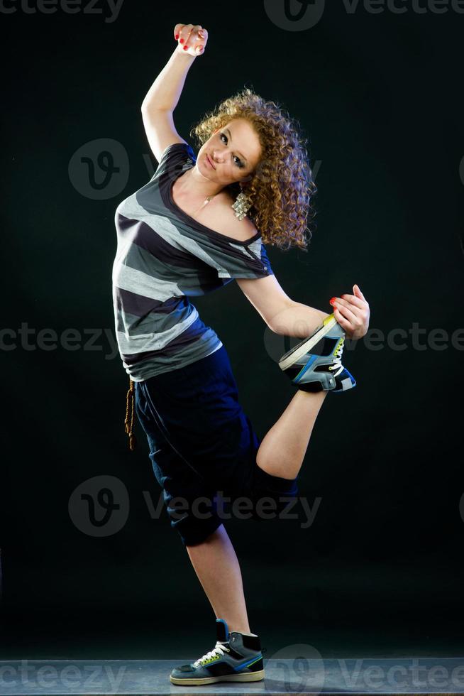 young woman dancing photo