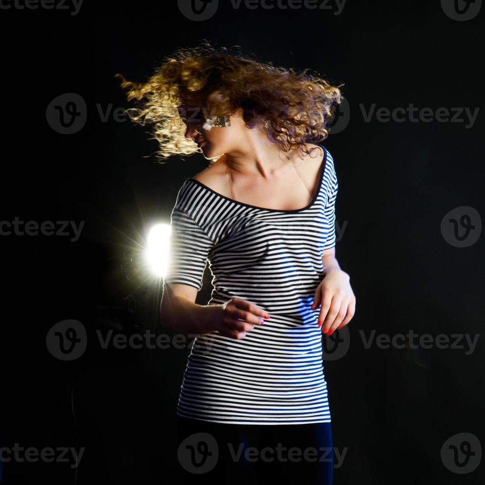 young woman dancing photo