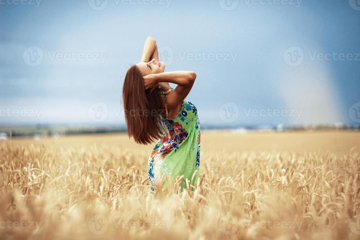 girl in wheat meadow photo