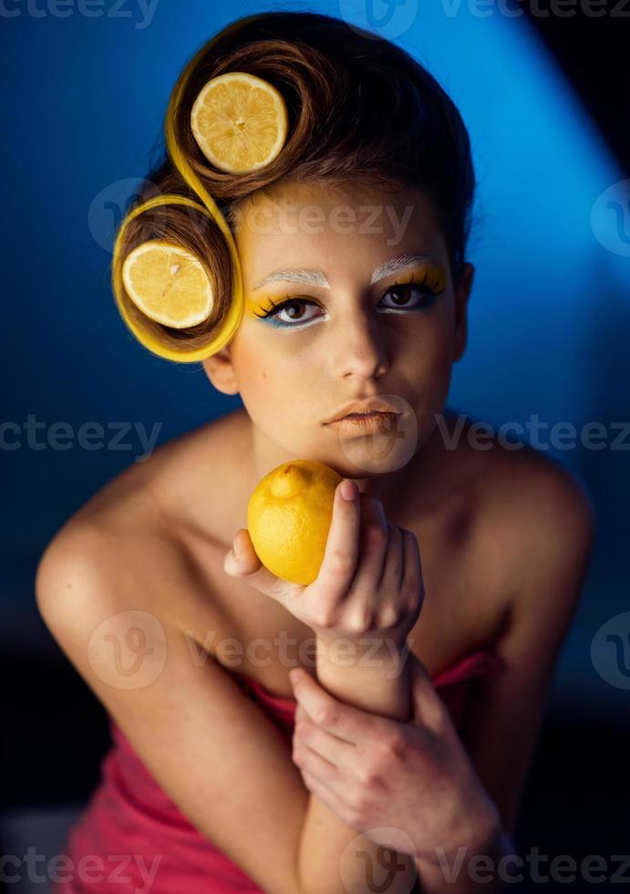 woman with fruit in hair photo