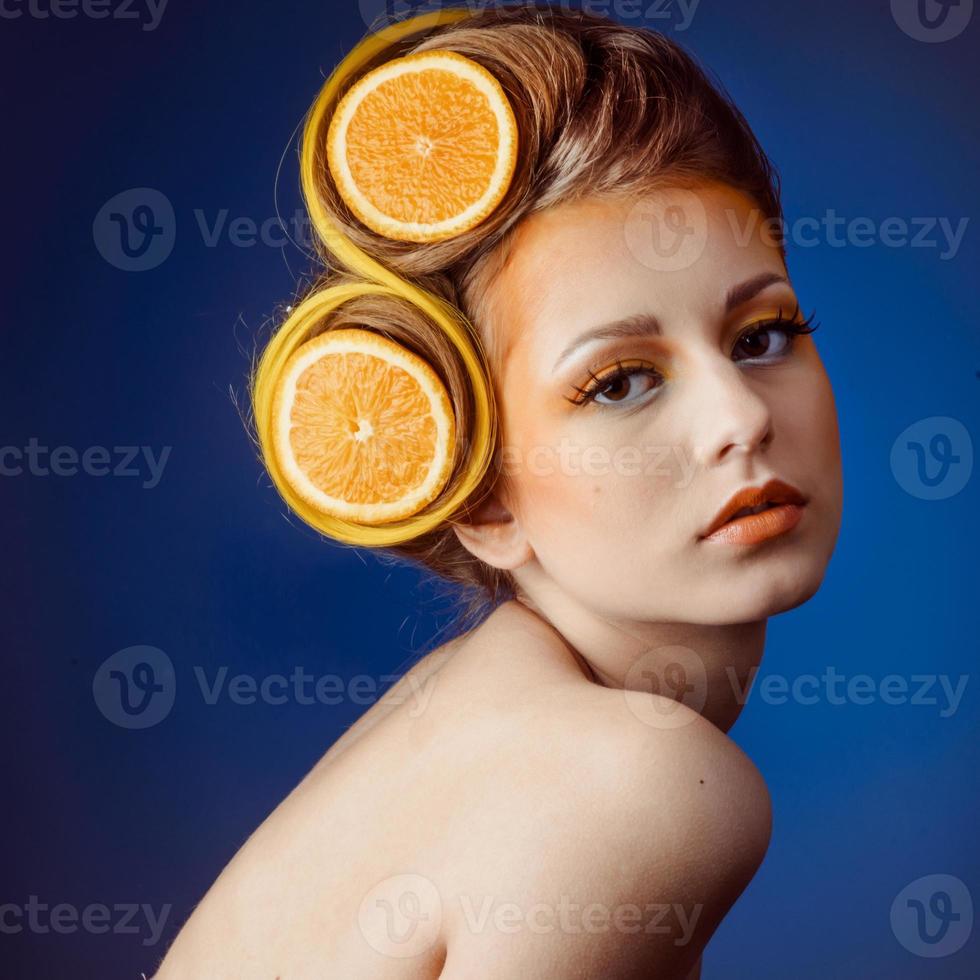 woman with fruit in hair photo