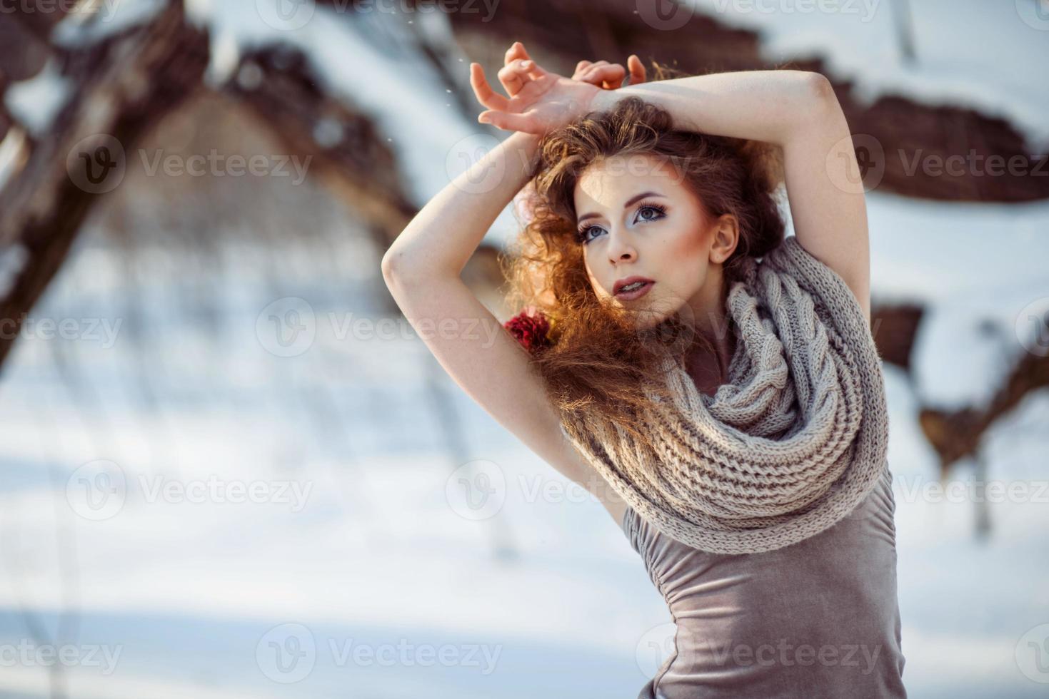 beautiful girl in the winter forest photo