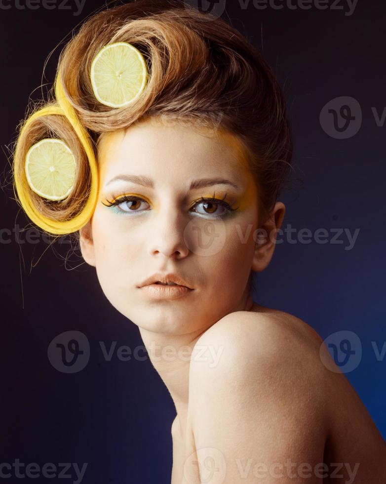 woman with fruit in hair photo