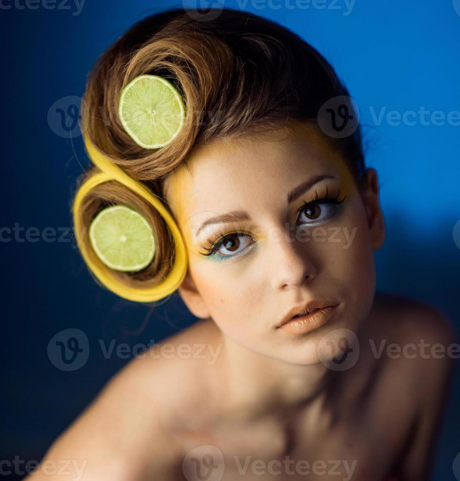 woman with fruit in hair photo