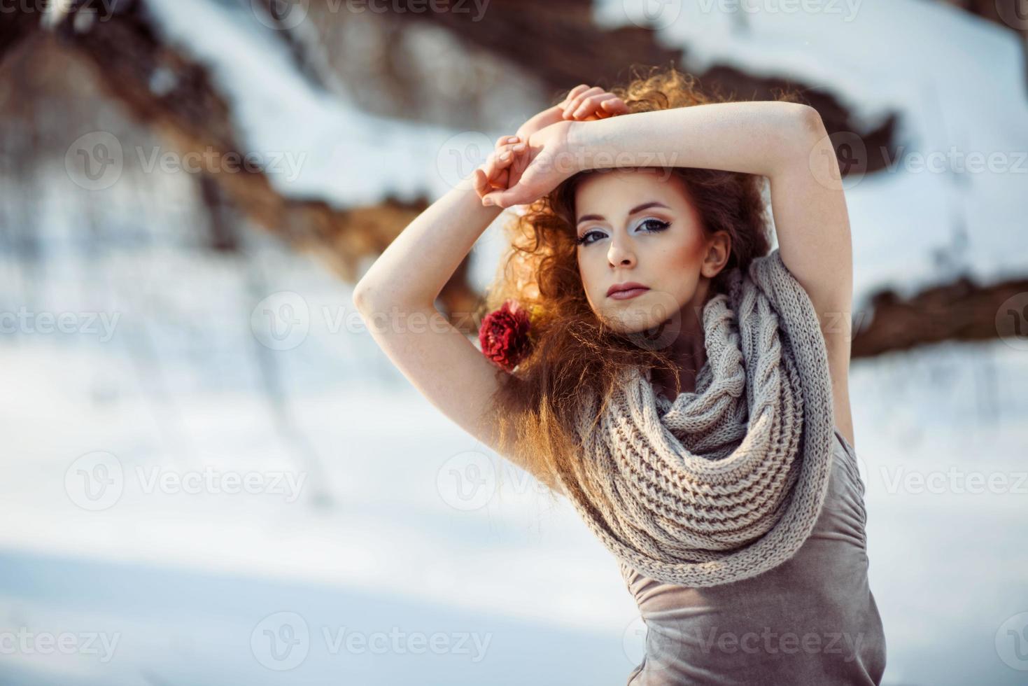 beautiful girl in the winter forest photo