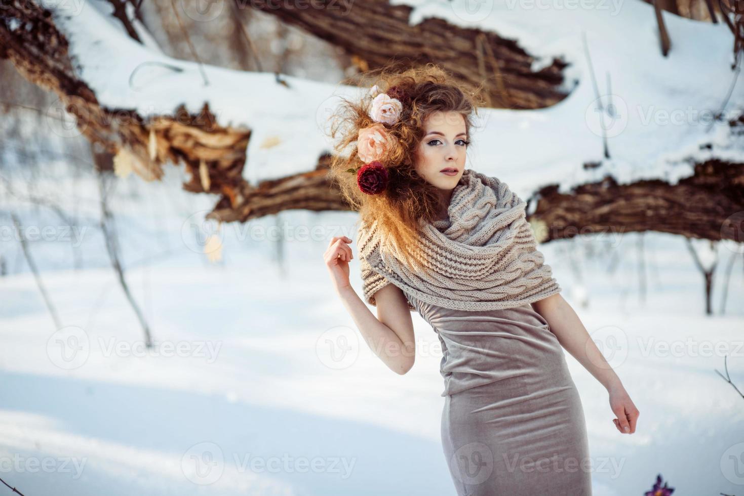 beautiful girl in the winter forest photo