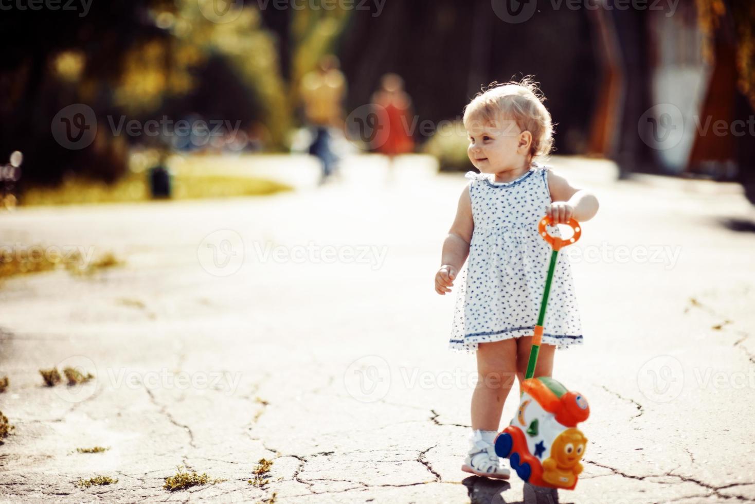 Little girl in the park photo