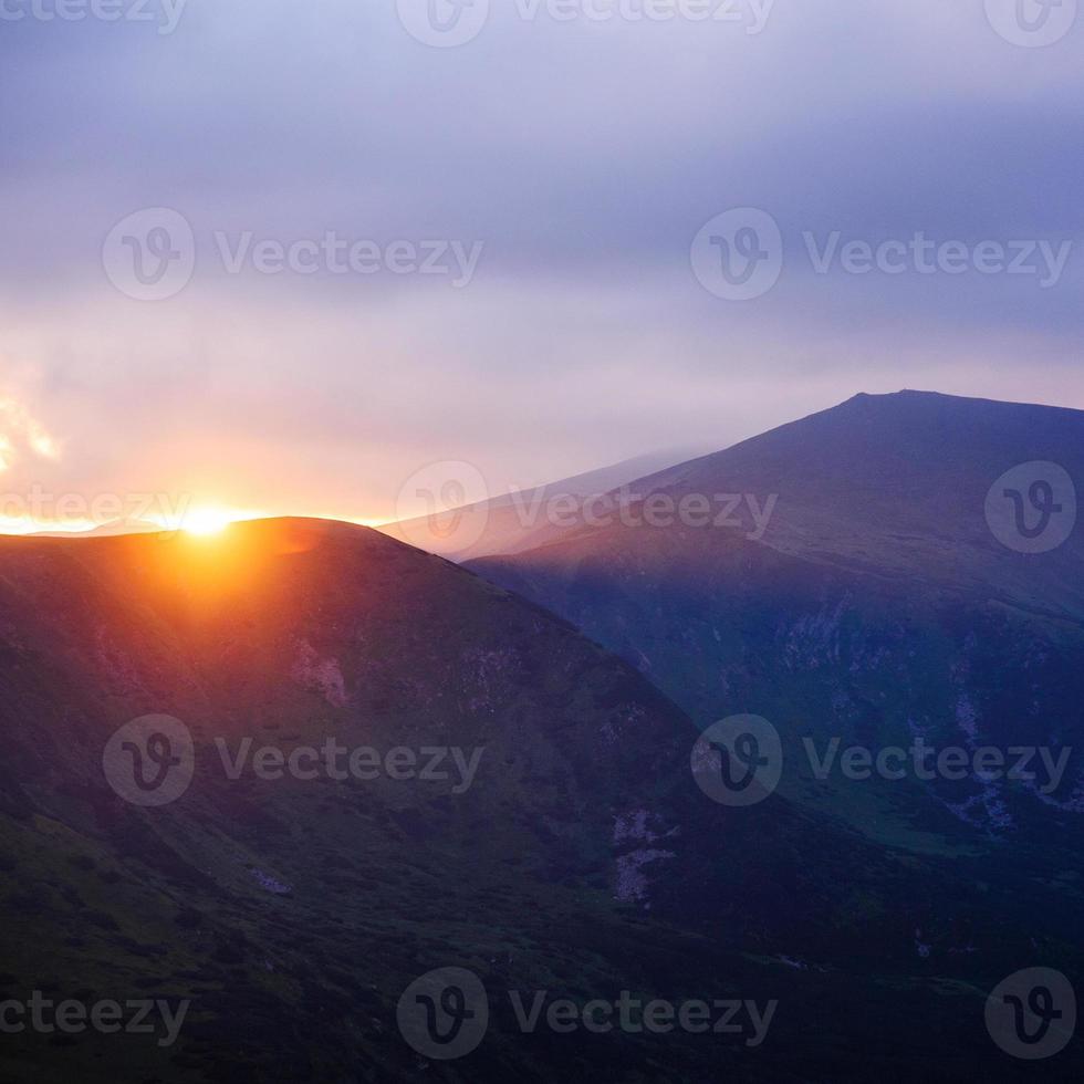 beautiful sunset in the mountains photo