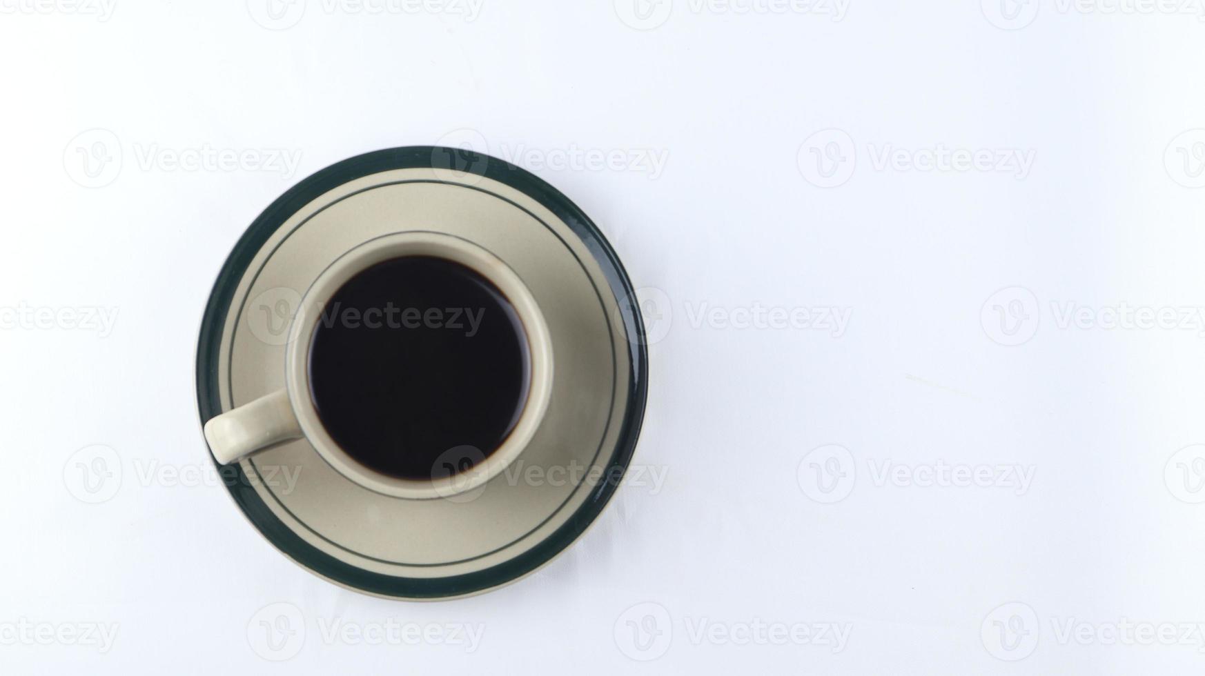 cup of black coffee on a white background. copyspace area photo