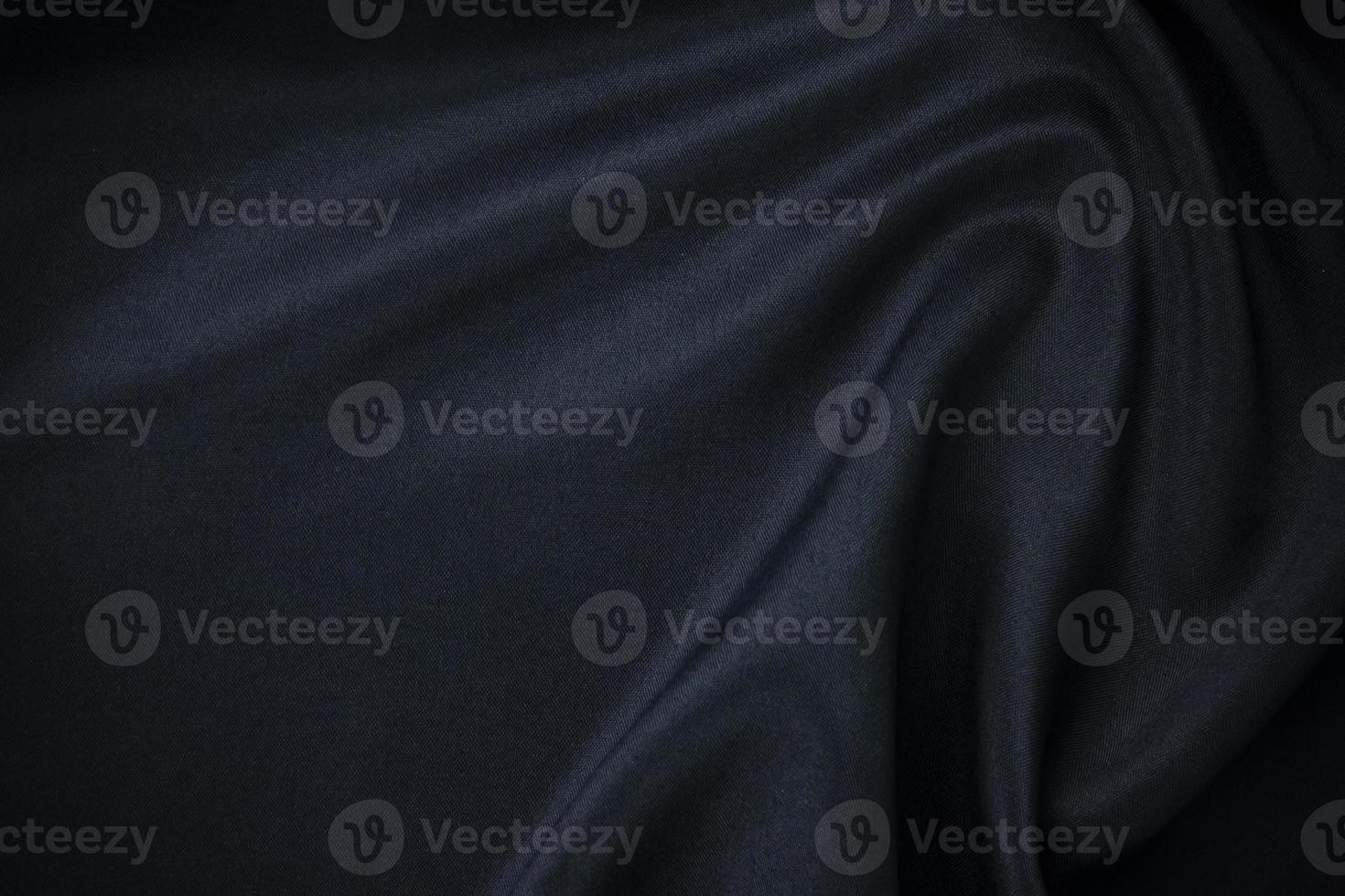 Modern dark gradient blue silk satin background. nice Soft folds on shiny fabric. Luxury background with spacing for text, design. Web banner. Flat lay, top view picture. photo
