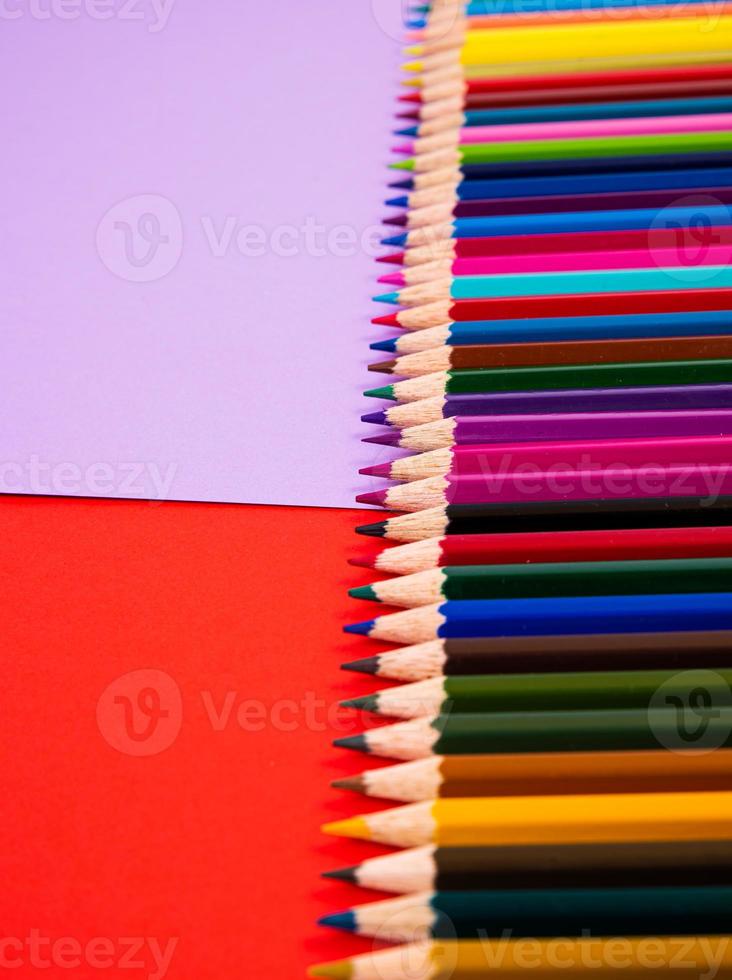 multi-colored pencils on multi-colored background, Close up, copy space, Modern art. Modern design photo