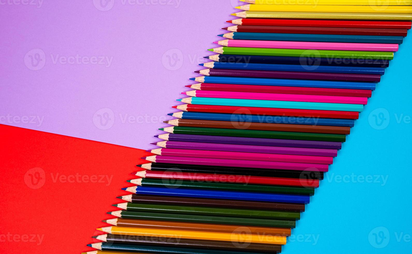 multi-colored pencils on multi-colored background, Close up, copy space, Modern art. Modern design photo