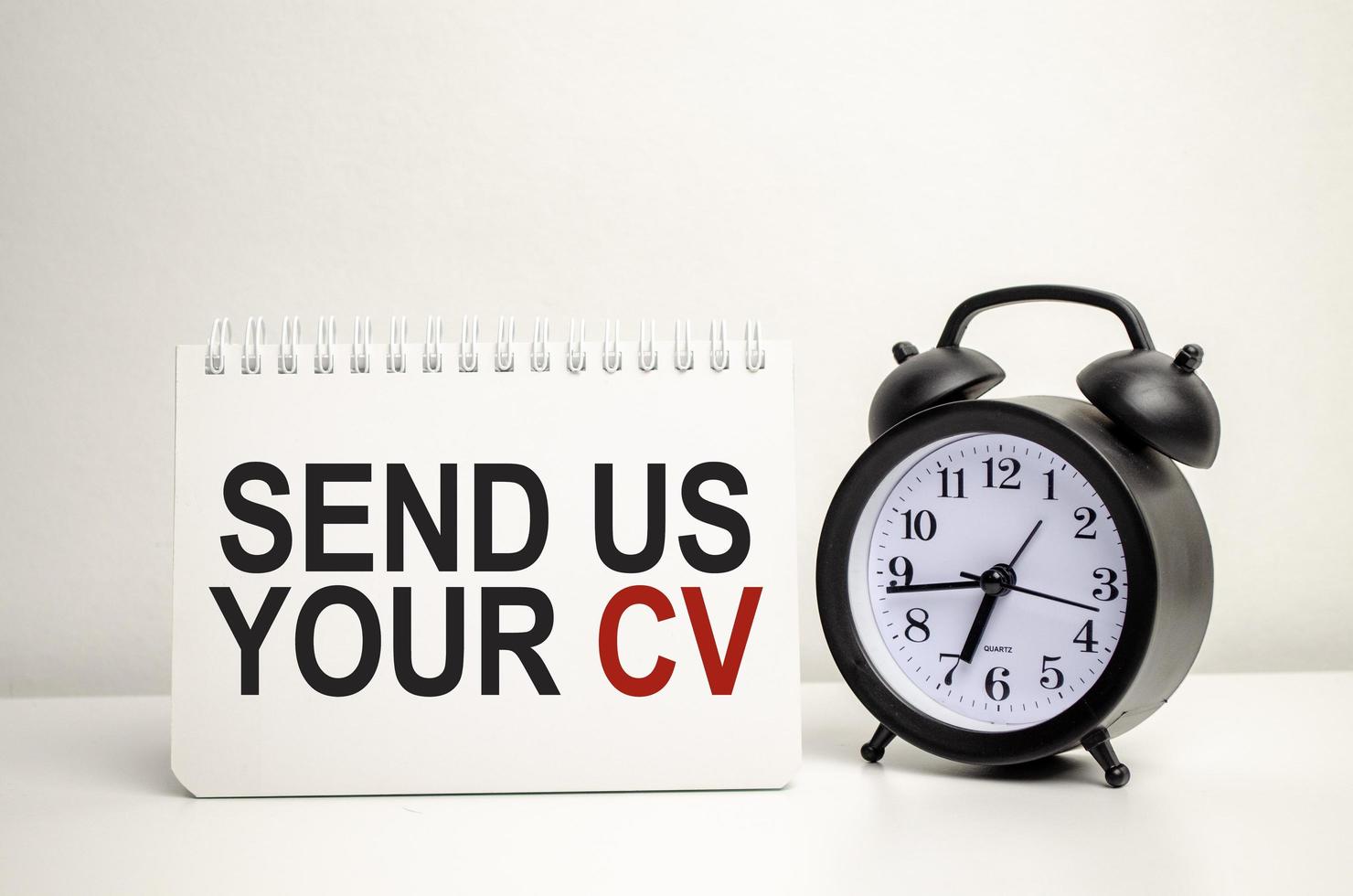 send us your cv words with calculator and clock with notebook photo