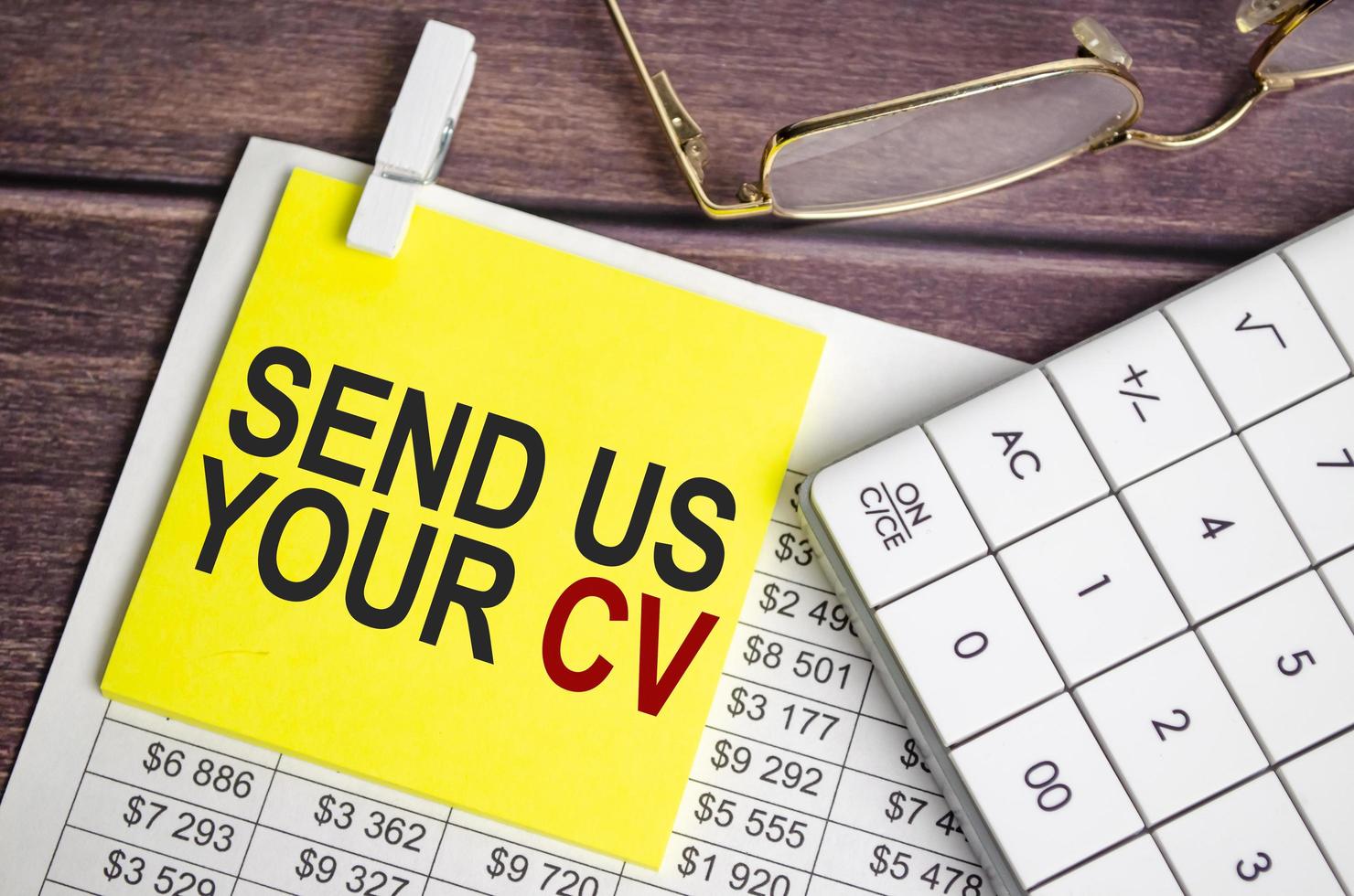 send us your cv Text on business paper on office table photo