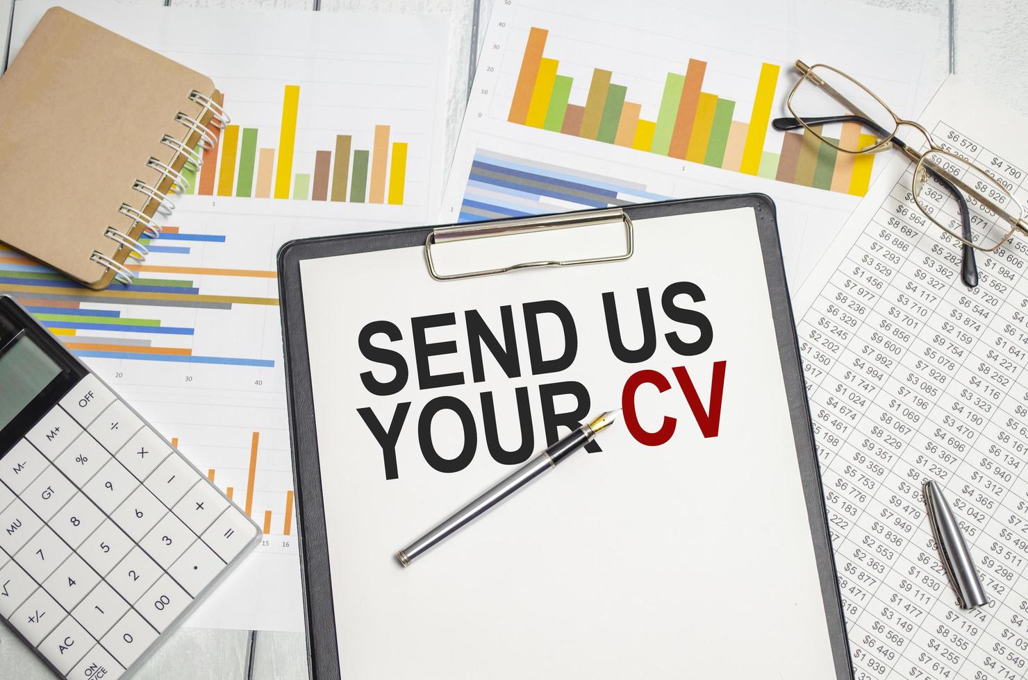 send us your cv words on paper tablet with calculator photo