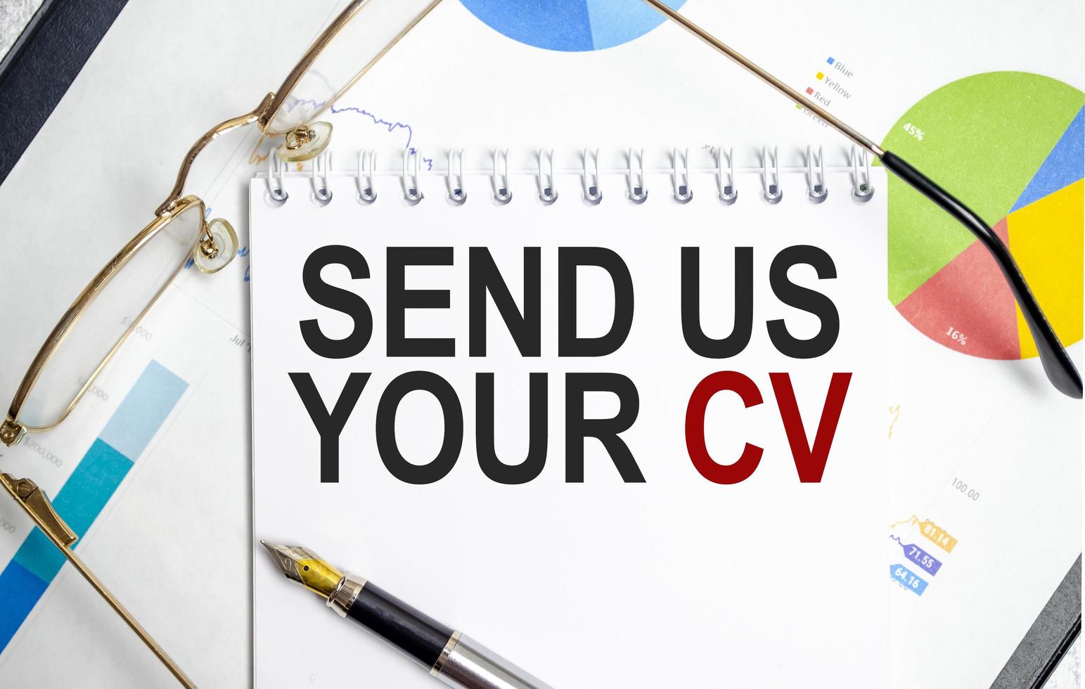 send us your cv words on notebook with glasses and charts photo