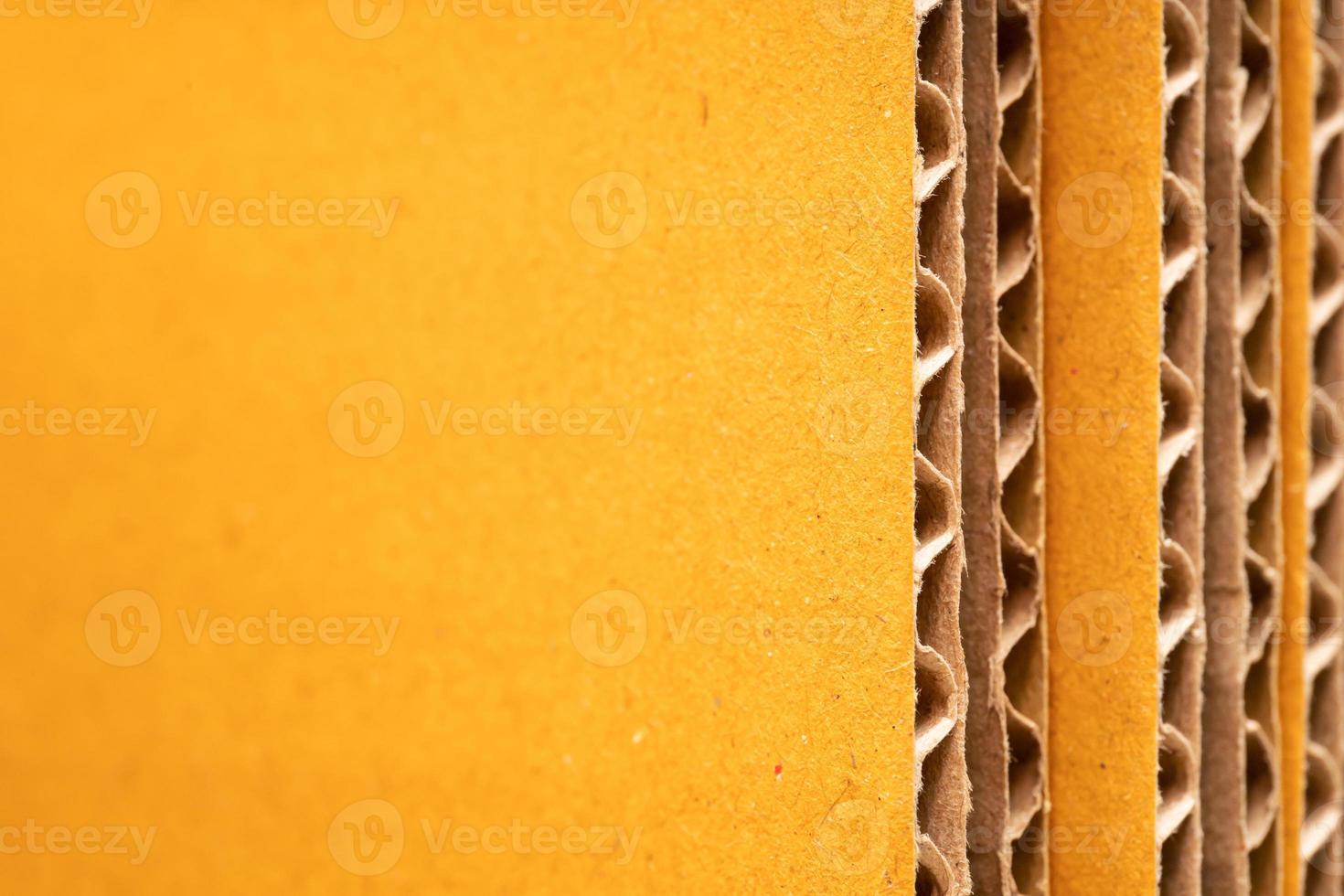 corrugated cardboard for packing. abstract background horizontal lines with wavy lines. Stack of unpacked not assembled cardboard box. photo