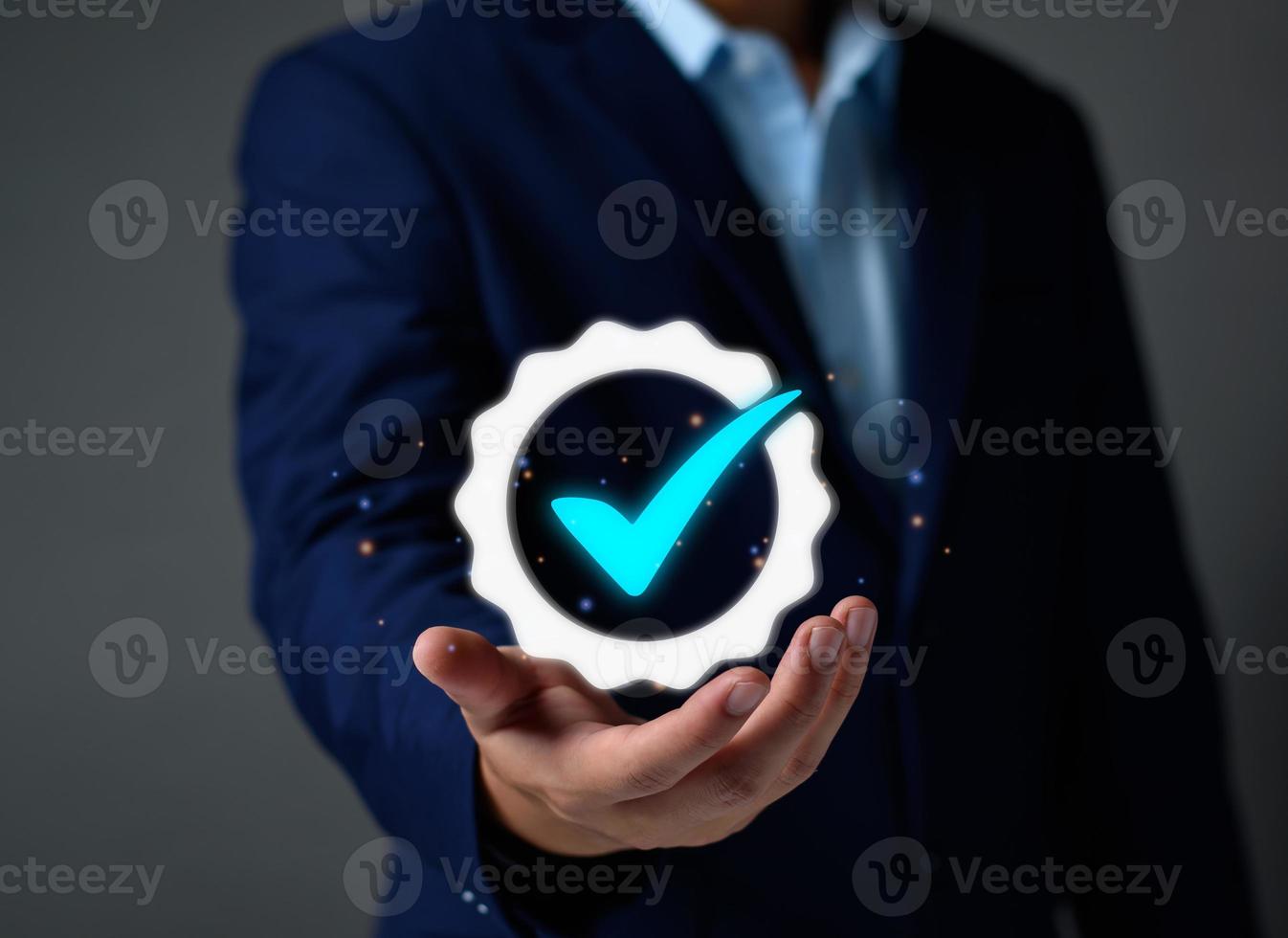 Quality Assurance Concept. Business people show high quality assurance mark, good service, premium, digital signature, premium service assurance, excellence service, high quality, excellence guarantee photo