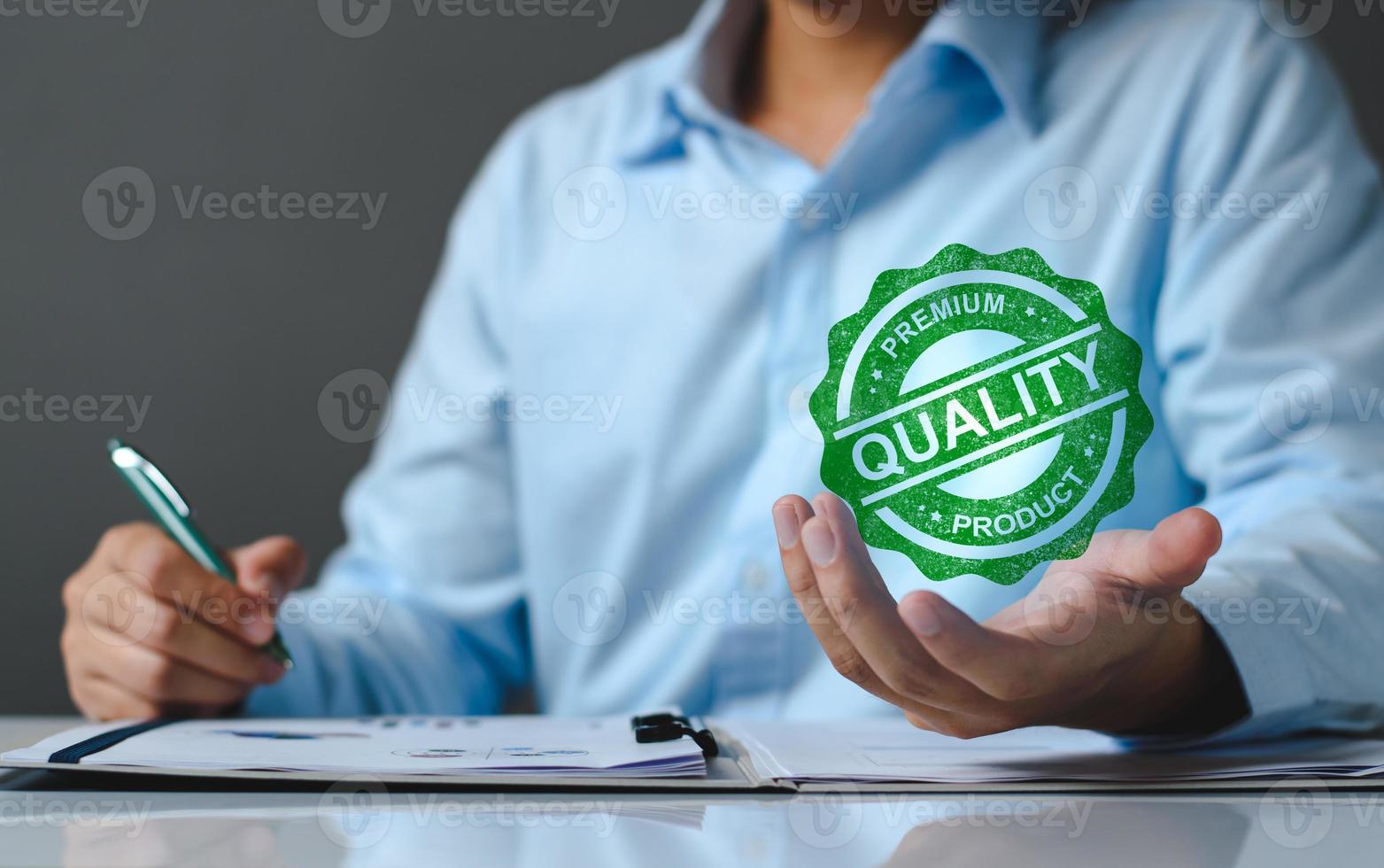 Quality Assurance Concept. Business people show high quality assurance mark, good service, premium, digital signature, premium service assurance, excellence service, high quality, excellence guarantee photo