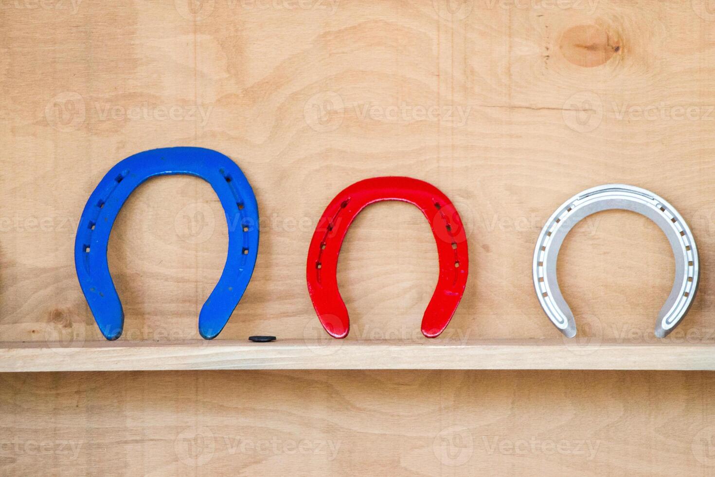 Lucky horseshoes with nail holes 15273190 Stock Photo at Vecteezy
