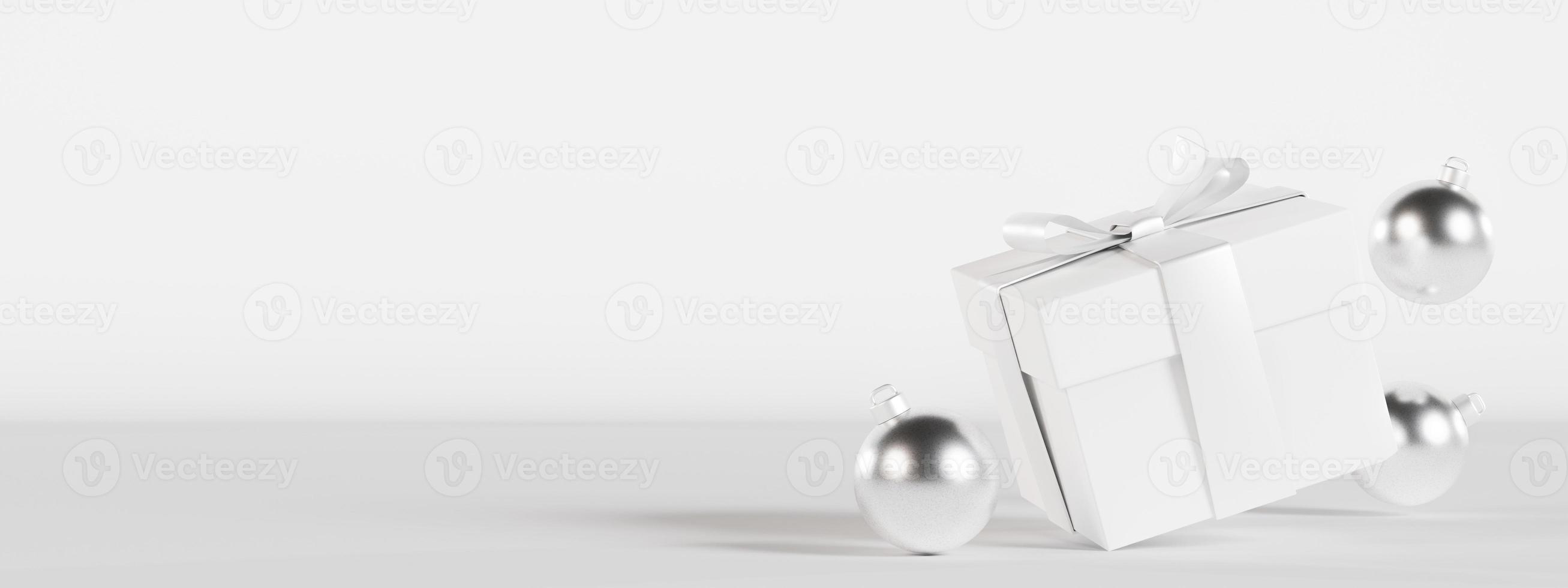 Gift box and silver Christmas decoration on white background with empty space for text. Present. Xmas banner with copy space. Minimalist design. Template for greeting, invitation card. 3D render. photo