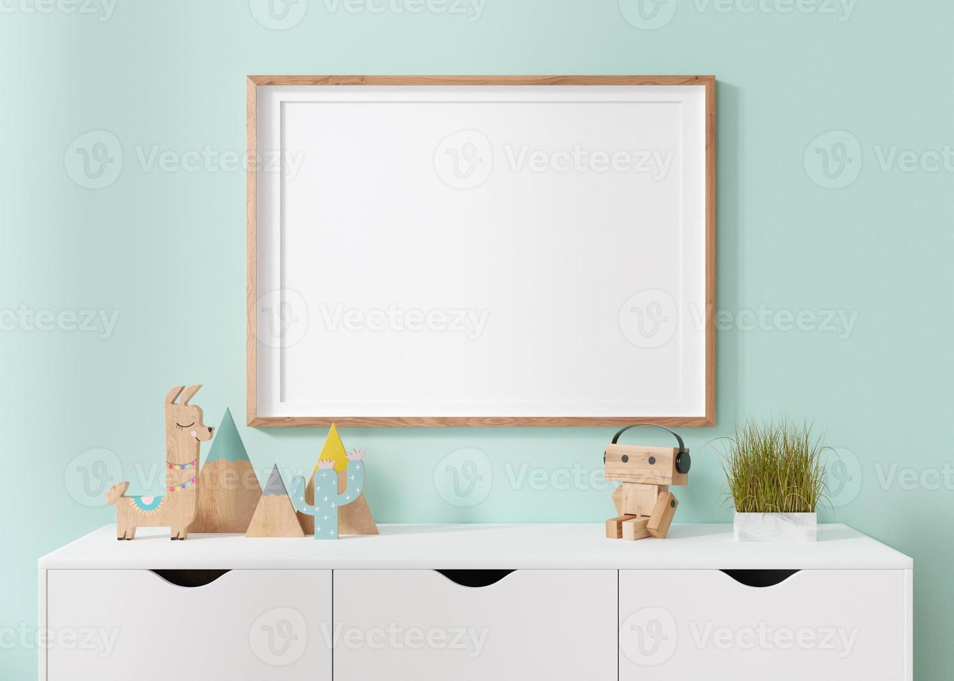 Empty horizontal picture frame hanging on blue wall in modern child room. Frame mock up in contemporary style. Free, copy space for picture, poster. Wooden toys. Close up view. 3D rendering. photo