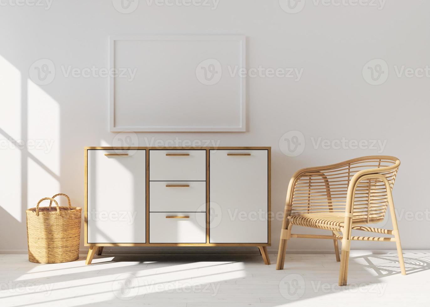 marco de imagen vacío en la pared blanca en la sala de estar moderna. maqueta interior en estilo escandinavo, boho. espacio libre, copia espacio para tu imagen. consola de madera y sillón de ratán. representación 3d foto