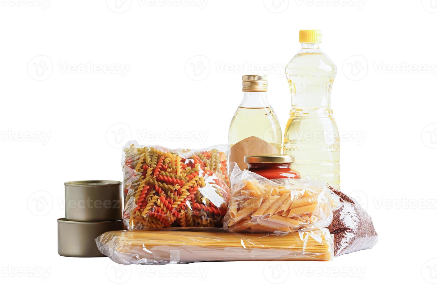 Foodstuffs in donation box isolated on white background with clipping path for volunteer to help people. photo