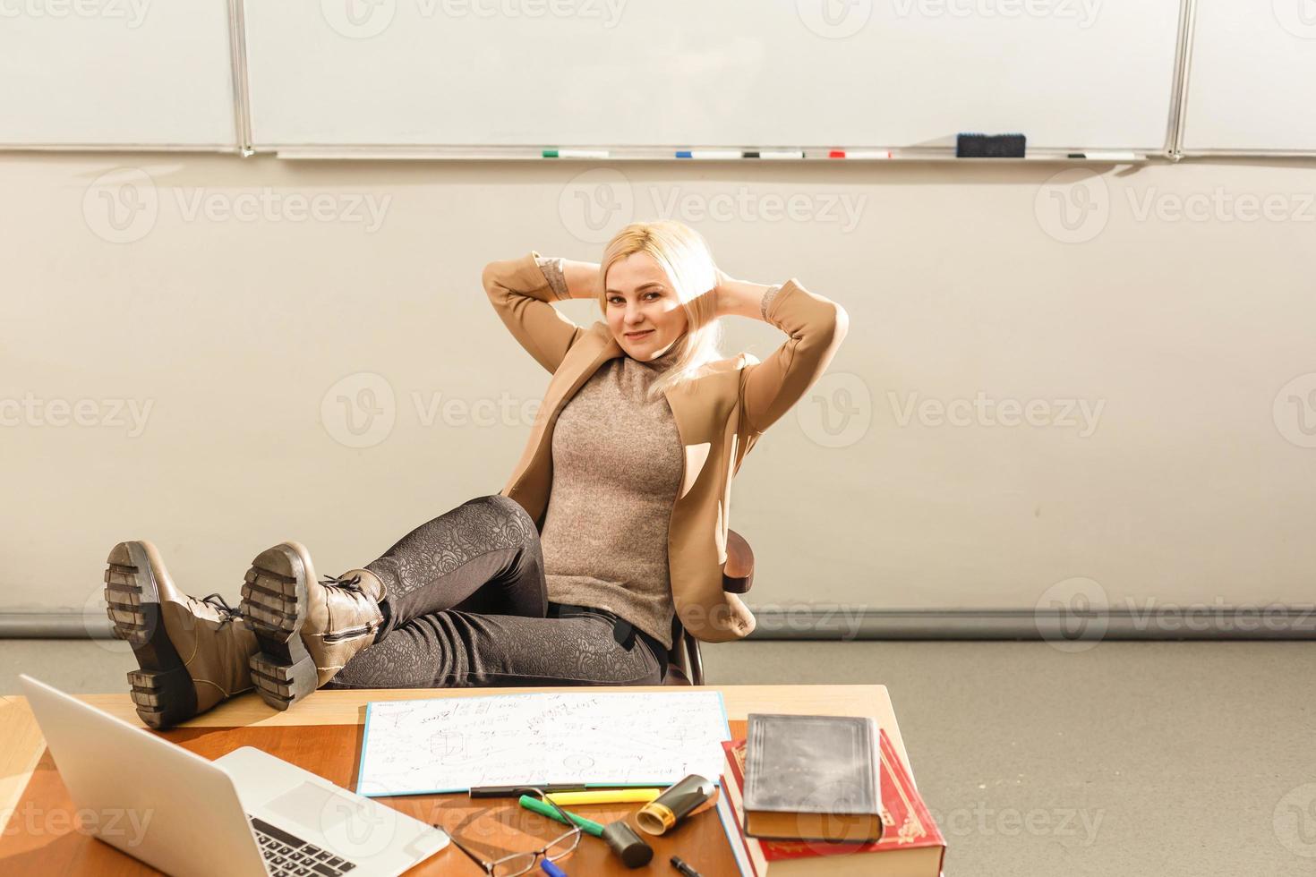 Teacher is skilled leader, Student looks for studying method that suits his learning style, Modern teacher hipster writing on big blackboard with math formula, Some students learn best by listening, photo