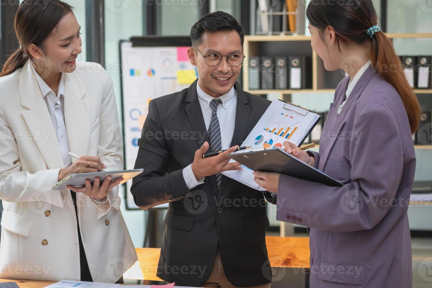 Marketing, Finance, Accounting, Planning, The company is team of marketers analyzes the company is profits using laptop computer graphs and calculators and tablet.Business concept photo