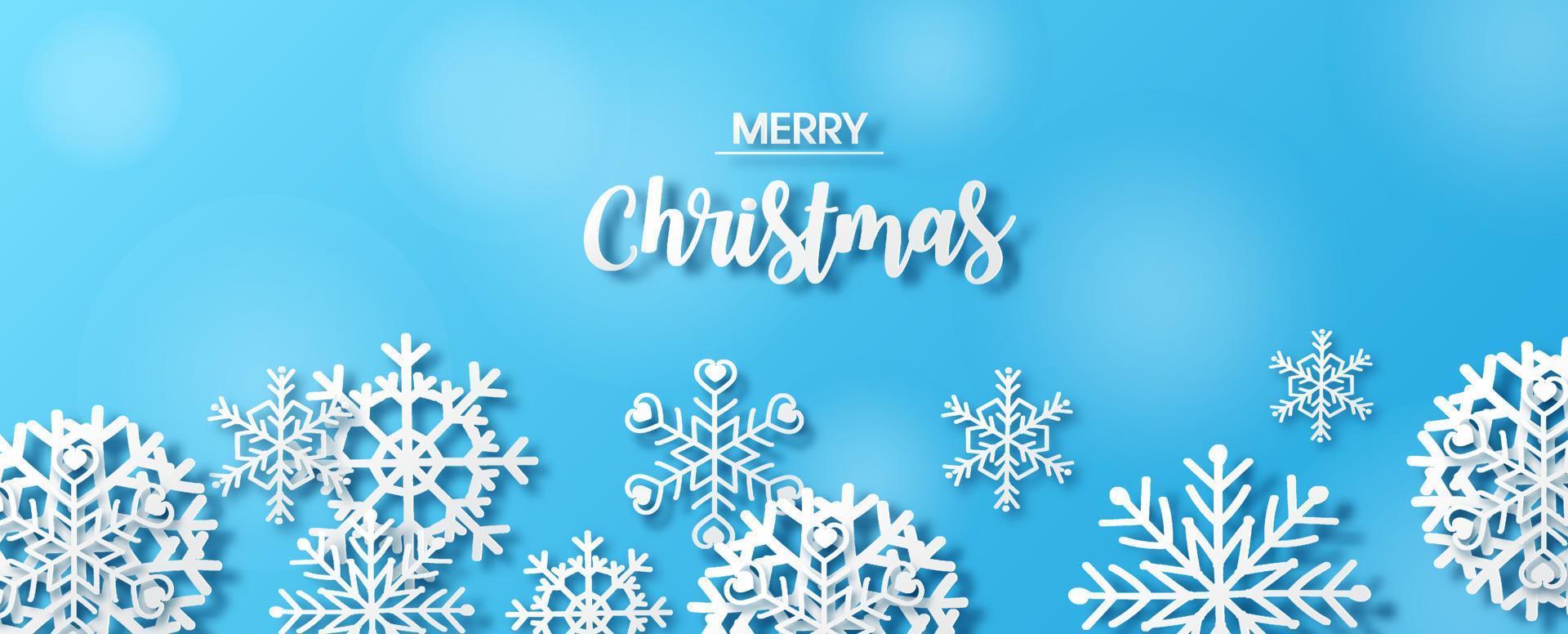 Closeup and crop variety snowflakes in paper cut style with MERRY CHRISTMAS texts on blurred and blue background. Christmas greeting card in vector and web banner design.