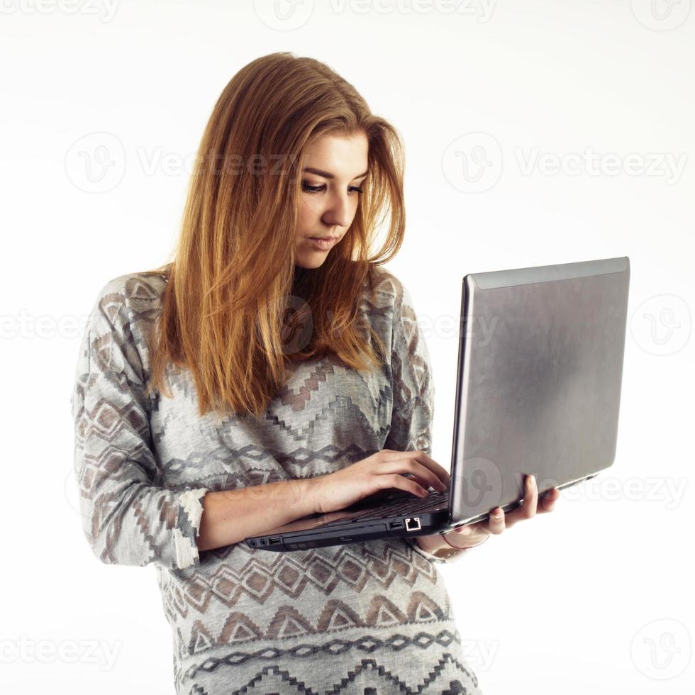 young businesswoman with laptop photo