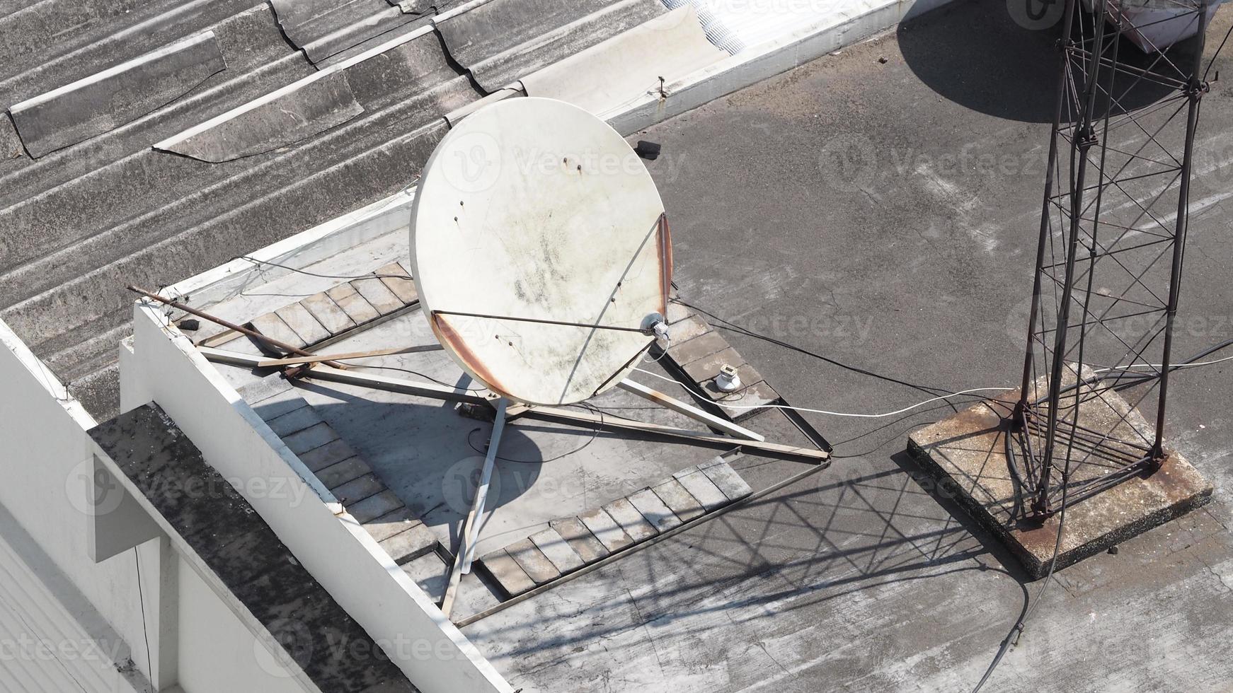 Old big telecommunication satellite dish. photo