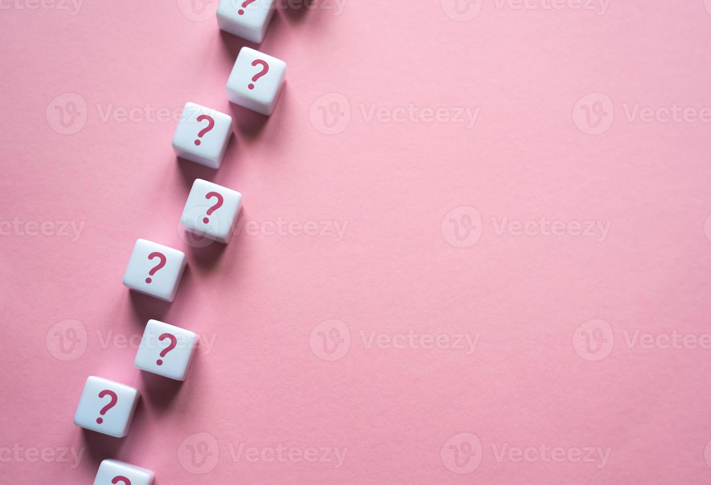 A chain of question marks on blocks. Questions and problem solving