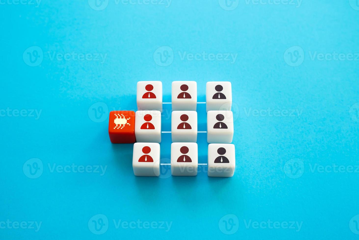 The computer virus infects the team through one member. Corporate system security. Malware. Network defense breakthrough. Security holes and bugs. Espionage and data leakage. photo